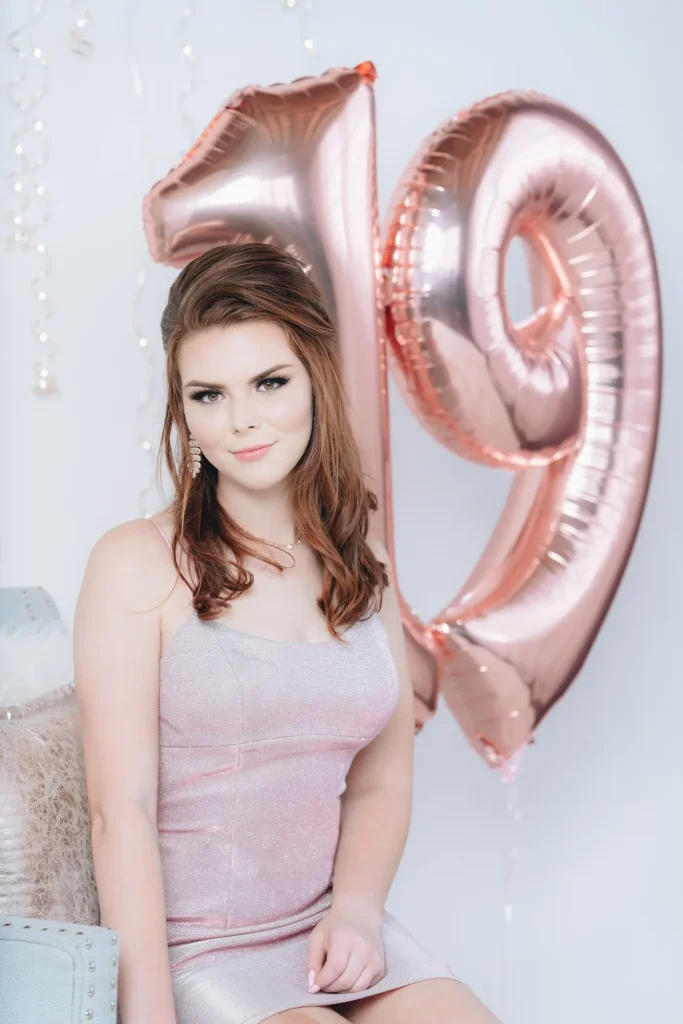 19th birthday portrait of young girl with glam hair and makeup